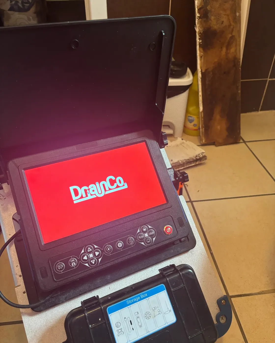 The camera unit on a survey. The screen tells us the size, distance and what is at each defect.